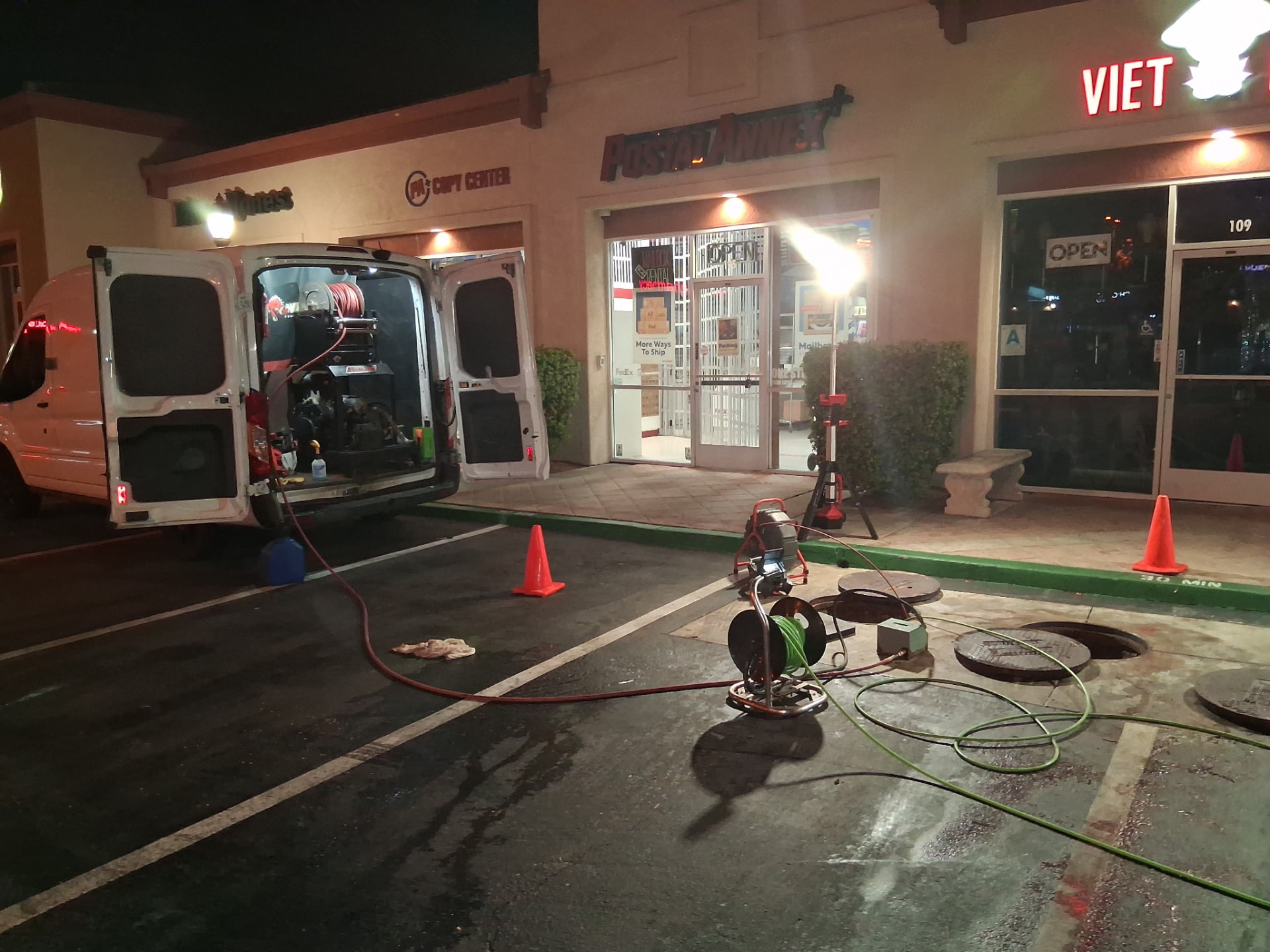 Service van and hose reel set up for grease line jetting at a restaurant in Temecula, California